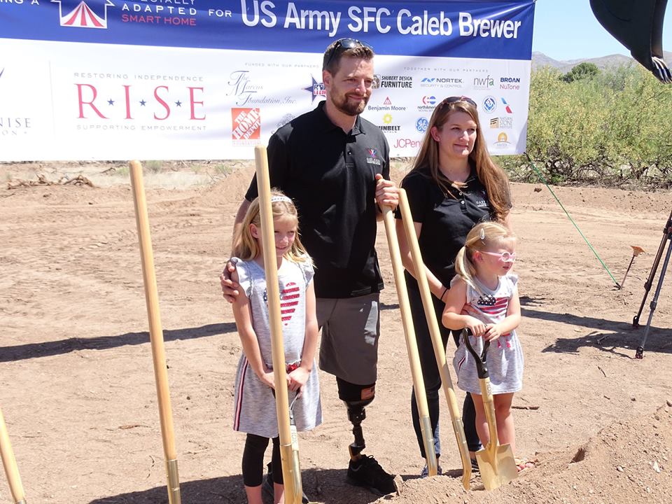 United States Army Sergeant First Class Caleb Brewer (Ret.) , with wife Ashley and daughters Evelyn and Emily at the groundbreaking.