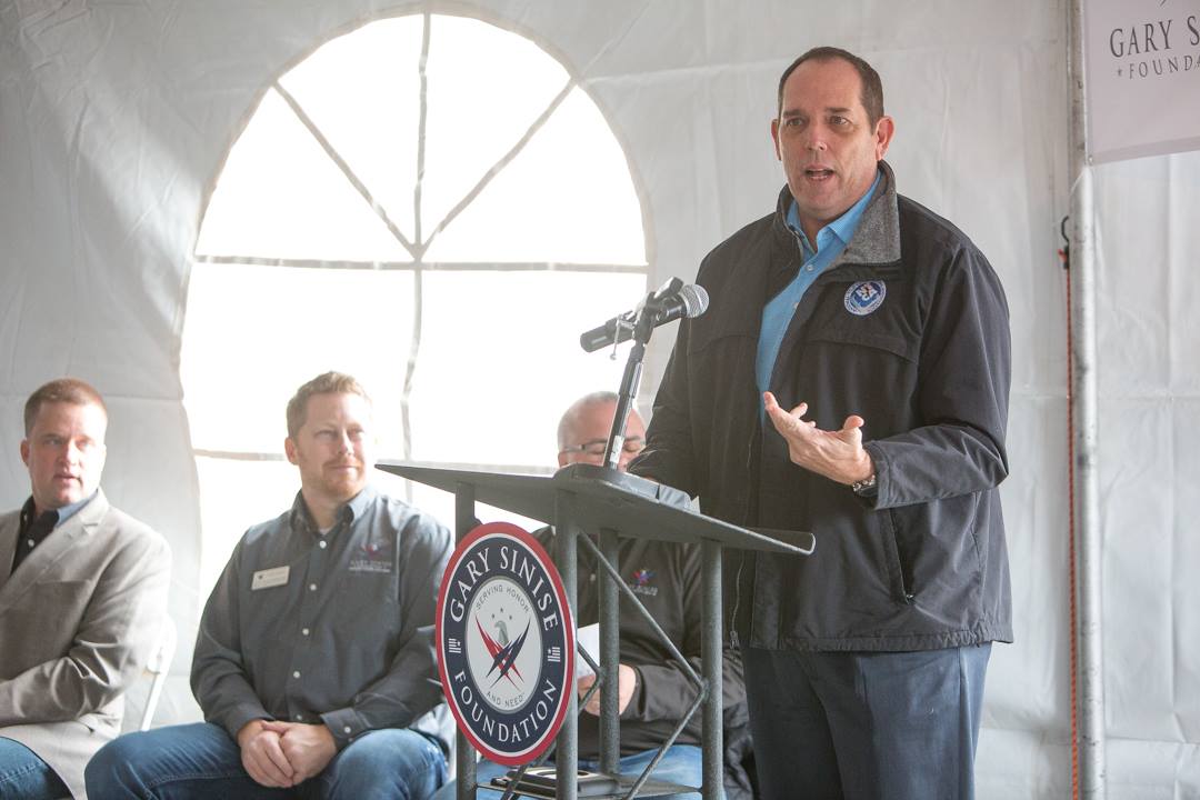 James Woelfel, of NTCA Five-Star Contractor Artcraft Granite Marble and Tile Co., Mesa, Ariz., speaking at the home dedication