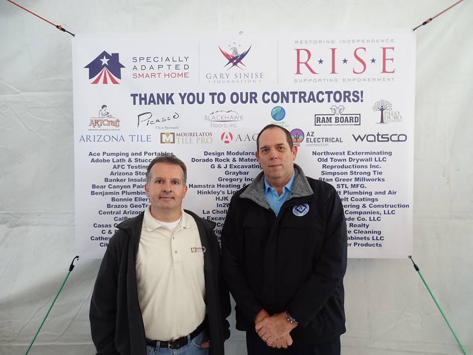 NTCA contractors John Mourelatos (l.) and James Woelfel at the home dedication.