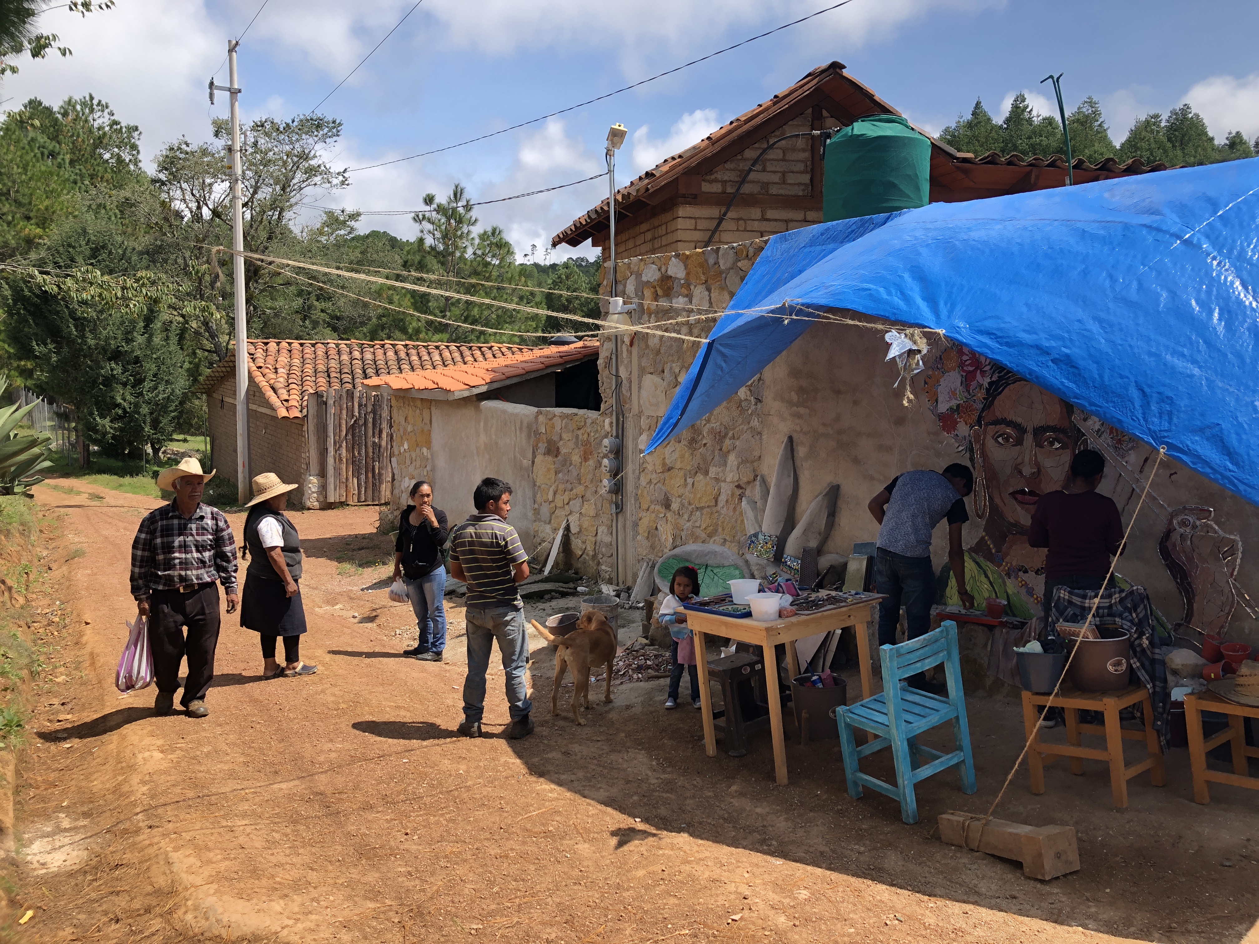 The worksite was located in a rural farming community. Neighbors and passers-by participated in various parts of the project and even made their own individual projects from tile that was not able to be used in the mural.