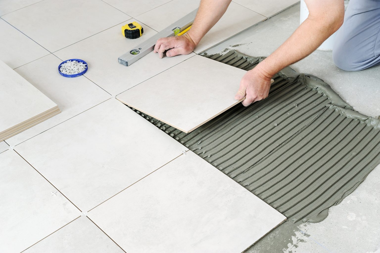 Understand the crucial difference between setting tile and building a