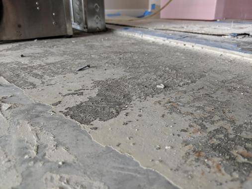 How do I remove old tile adhesive?